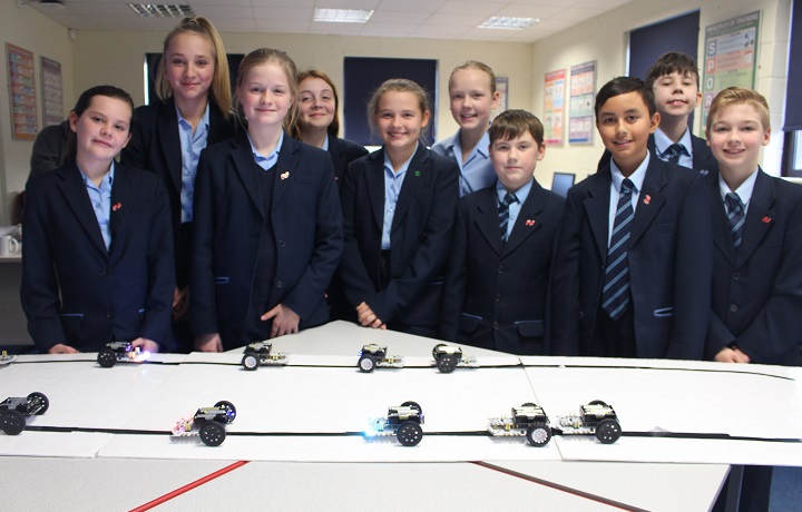 School children with robots