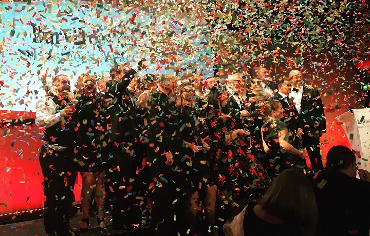 Business Awards winners with confetti 