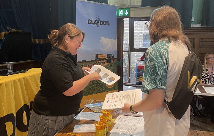 Ellie Clements of Claydon Drill with member of the public