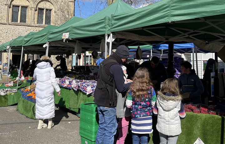 Market stall with customers 